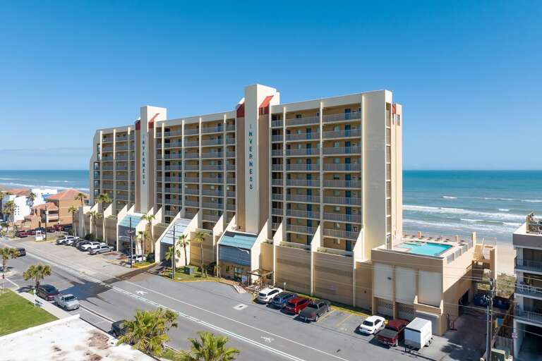 The oceanfront Inverness Condominiums features a large private pool, two hot tubs, and endless views of the Gulf!