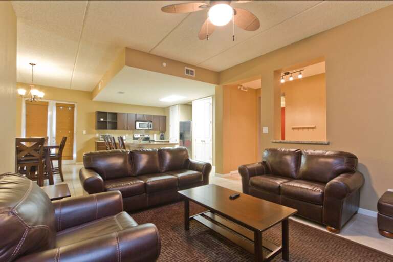 Open kitchen, dining, and living area concept.