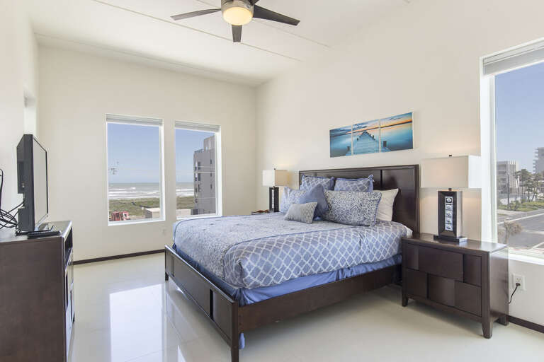 Master bedroom with a king bed Master bedroom with a king bed