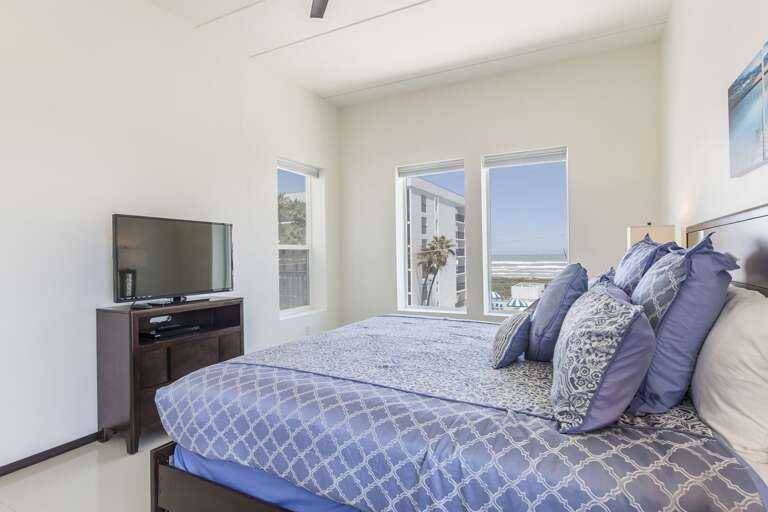 Master bedroom with a king bed Master bedroom with a king bed