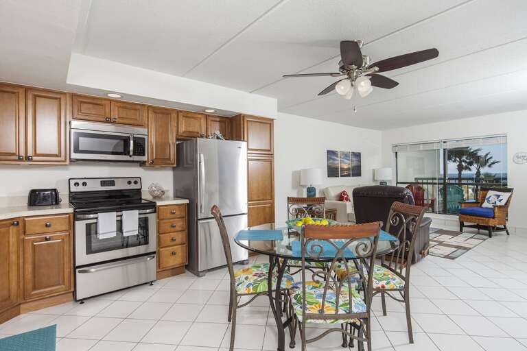 Open concept living, kitchen, and dining area.