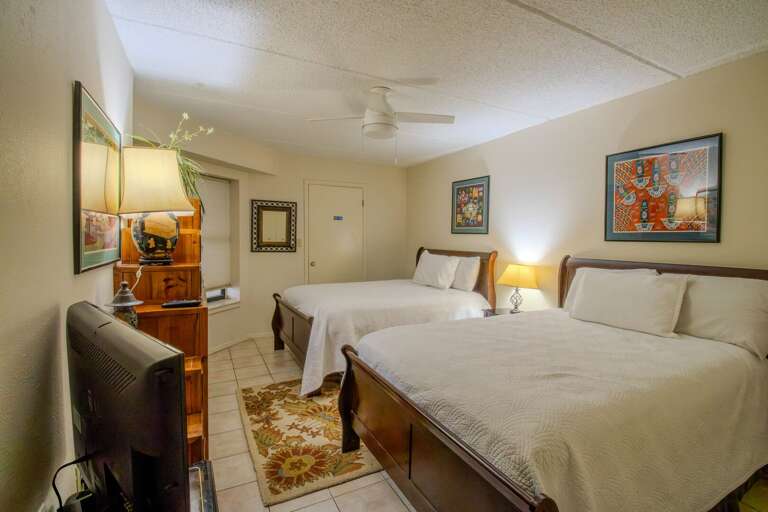 Guest bedroom with two full beds Guest bedroom with two full beds
