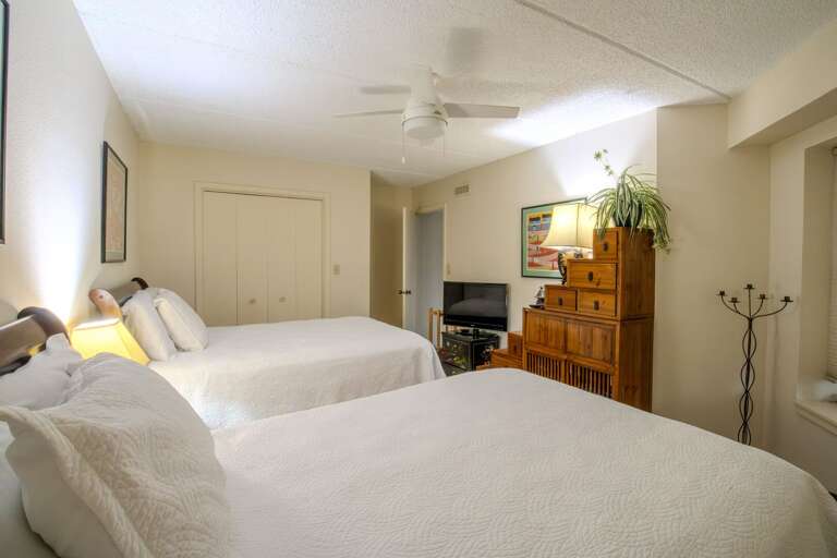 Guest bedroom with two full beds