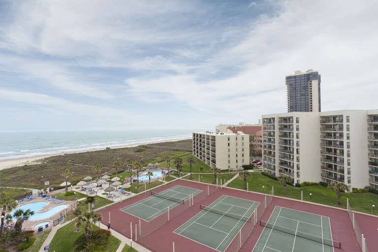 Aerial view of Saida Condominiums! Ocean Front, tennis courts and several community swimming pools!