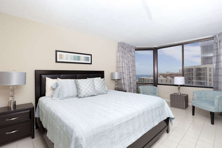 Master bedroom with a king bed and beautiful views of the beach!