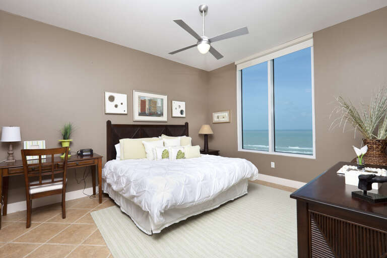 Master bedroom with a king bed and views of the beach! Master bedroom with a king bed and views of the beach!