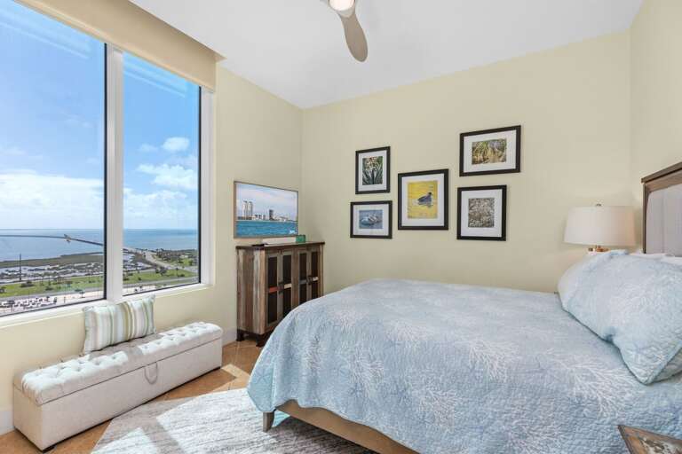 Guest bedroom with a queen bed and a flat screen TV!