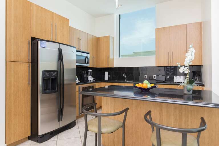 Fully stocked Kitchen area with pots, pans, and utensils to prepare your favorite meals!