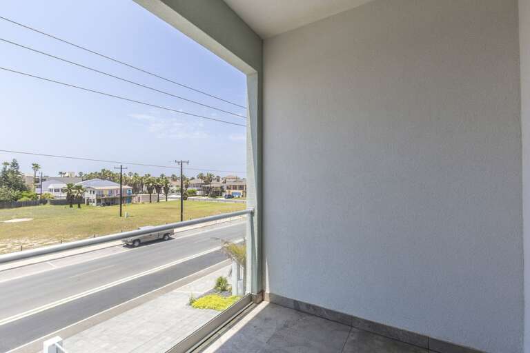 Guest bedroom balcony overlooking the street. Guest bedroom balcony overlooking the street.