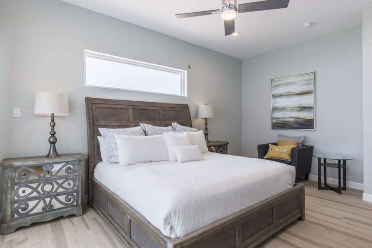 Master guest bedroom with a king bed and balcony with beach views. (2nd Floor) Master guest bedroom with a king bed and balcony with beach views. (2nd Floor)