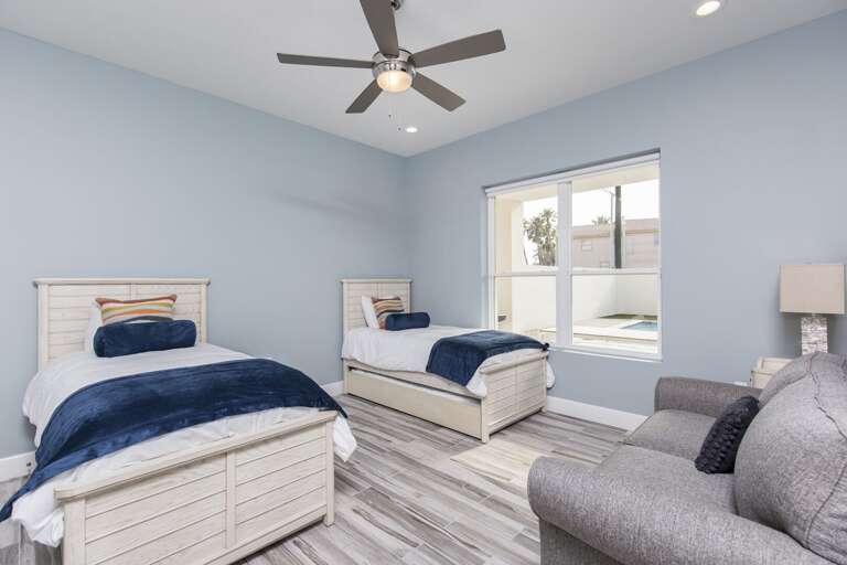 Bedroom #5 with twin beds featuring trundle beds each (ground floor)