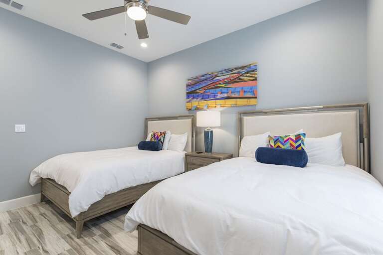 Third floor bedroom with queen beds