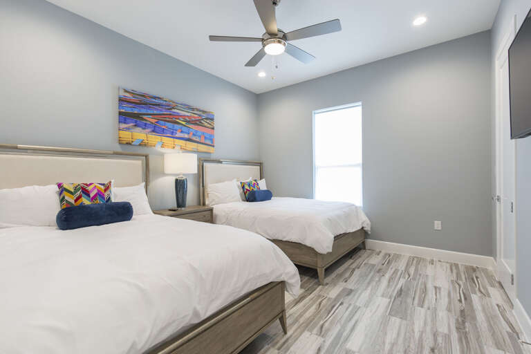 Third floor guest bedroom with two beds