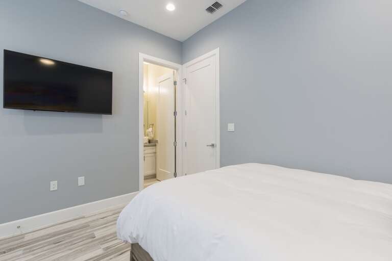 Third floor guest bedroom with two beds