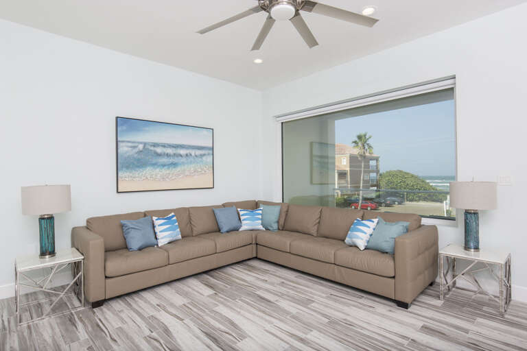 Second floor living area with 65" HD Smart TV