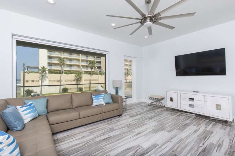 Second floor living area with 65" HD Smart TV