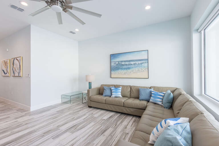 Second floor living area with 65" HD Smart TV