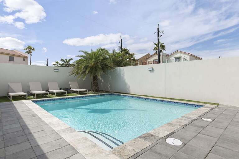 Poolside lounging is perfect to catch a tan!