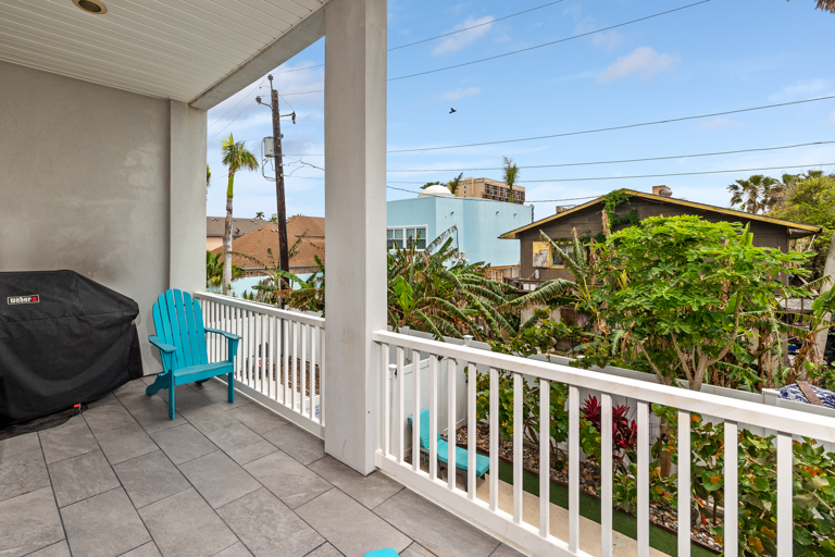 2nd floor balcony with BBQ Grill overlooks the private pool. Located off the kitchen.