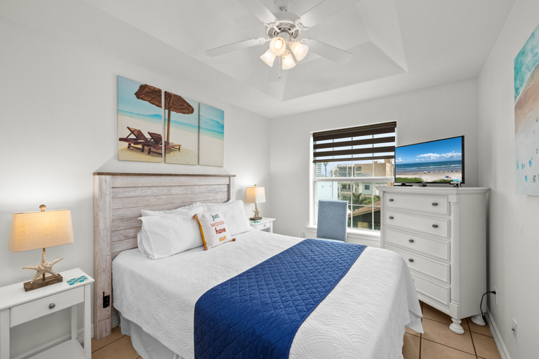 Third floor guest bedroom with full bed.