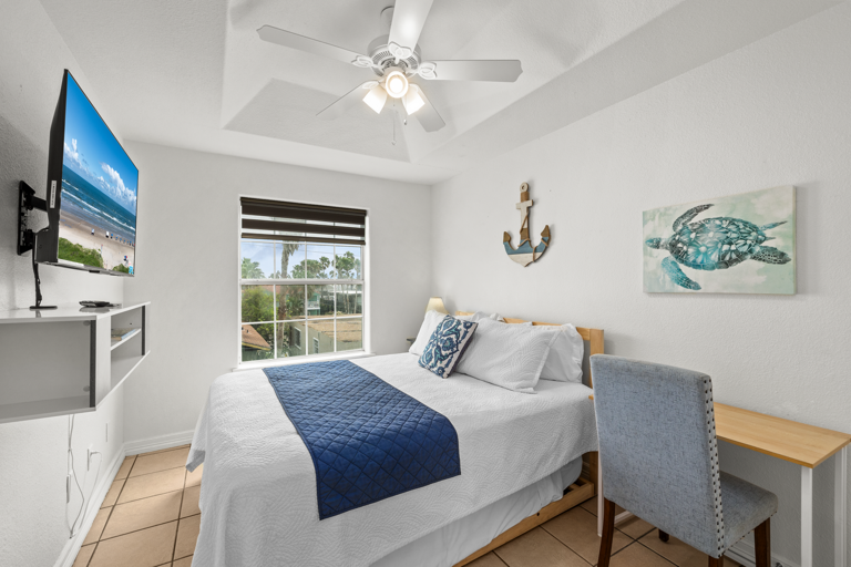 Guest bedroom with queen bed and trundle
Flat screen TV.