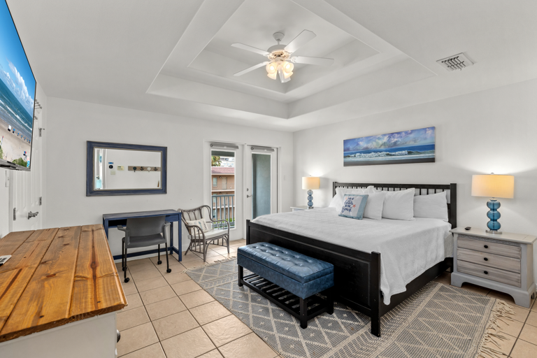 Master bedroom with king bed and private master bathroom.