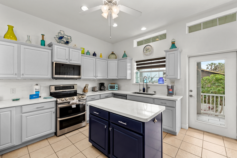 Spacious kitchen fully equipped with pots, pans, dishware & utensils!