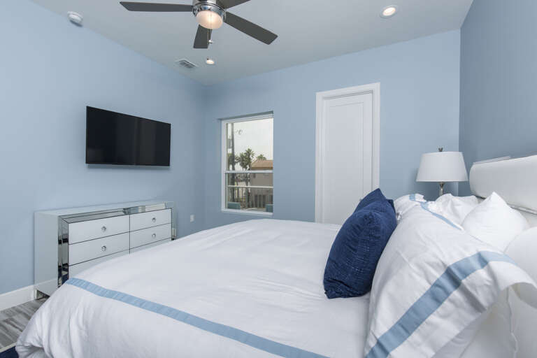 2nd floor bedroom with a king bed