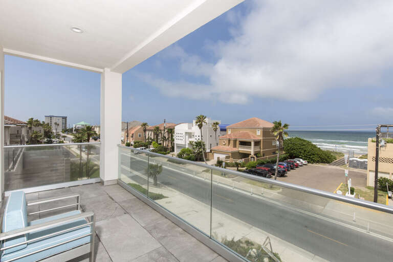 Balcony View Of Oceanfront Residential Area