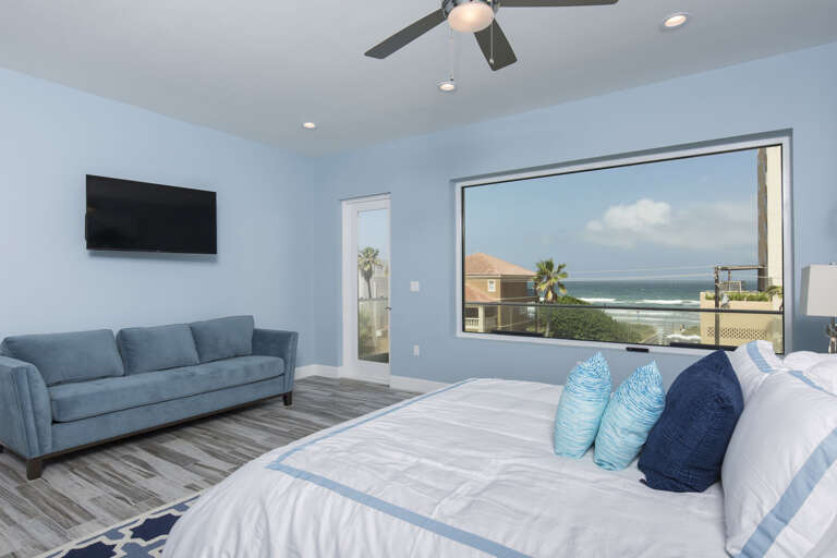 Third floor master bedroom with king bed and beautiful Beach views