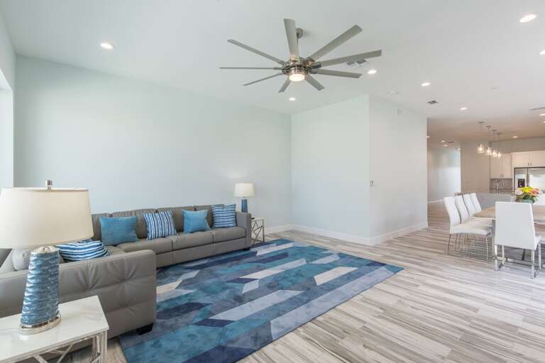 Open concept living, dining, and kitchen areas.