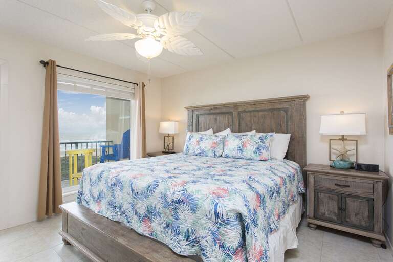 Master bedroom with King size bed, flat screen TV & private bathroom.