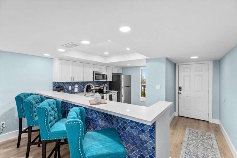 Kitchen bar has extra seating for up to 4!