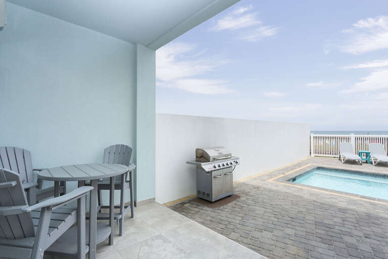Extra poolside seating with Propane Grill available for guests use