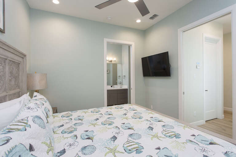 Ground floor guest bedroom with a King bed and en-suite.