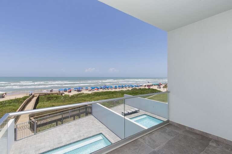 Balcony with view of the private heated pool