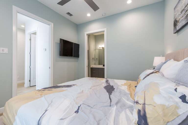 Ground floor guest bedroom with a king bed