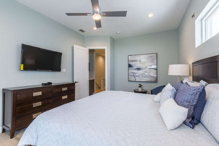 Master bedroom with a king bed and en-suite bathroom