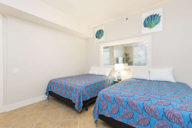 2nd bedroom with two Queen beds (sleeps 4) and attached bathroom.