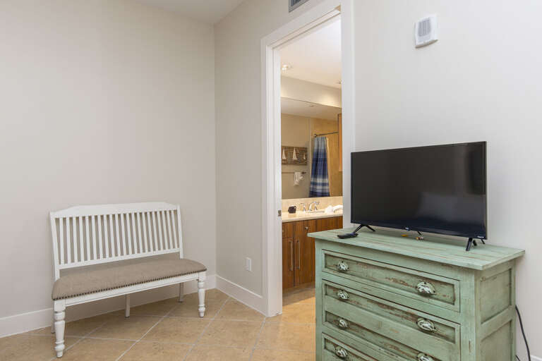2nd guest bedroom is equipped with flat screen TV and a private bathroom.