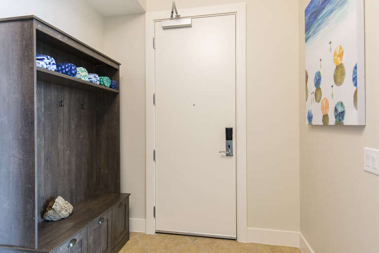 Entryway with a rack to place your sandy shoes & beach gear!