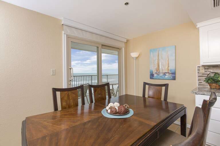 Dining room with balcony access. Dining room with balcony access.
