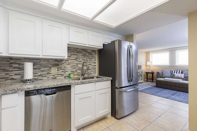 Kitchen with stainless steel appliances. Kitchen with stainless steel appliances.
