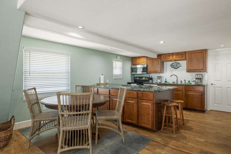 Open concept kitchen/ dining room. Open concept kitchen/ dining room.