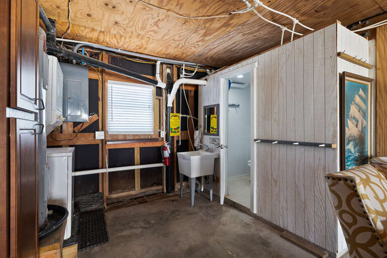 Washer and dryer located on the ground level and a 1/2 bath Washer and dryer located on the ground level and a 1/2 bath