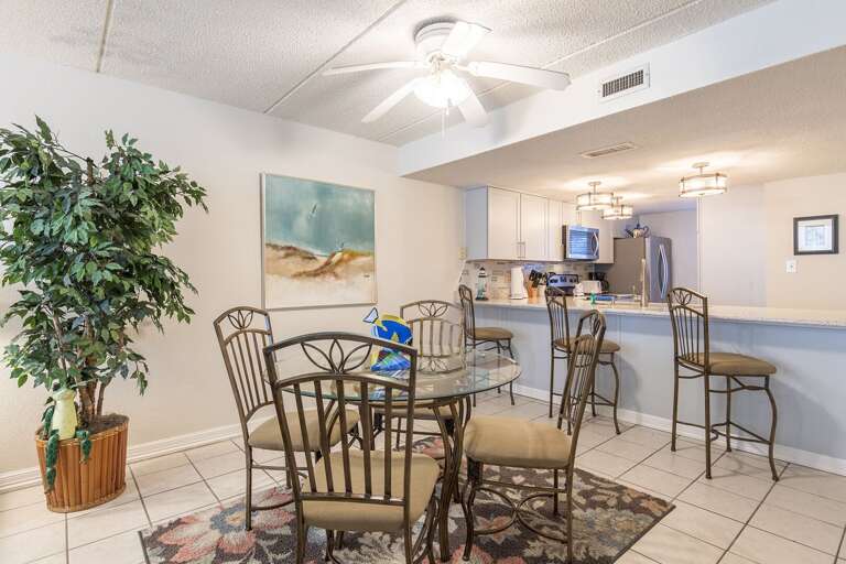 Dining Table sits 4 with additional bar counter seats to enjoy family dinners