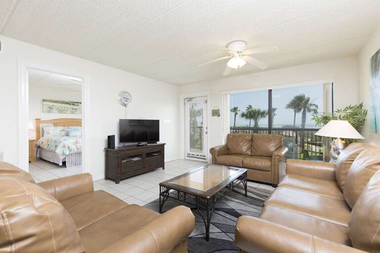 Living Area surrounds a Flat Screen TV to enjoy family movie nights!