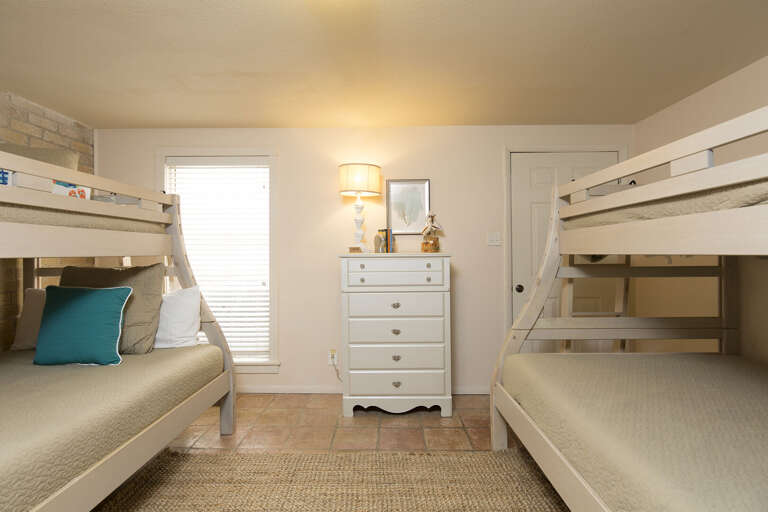 1st Floor Guest Bedroom features a set of Bunk Beds with Twin over Full size beds!