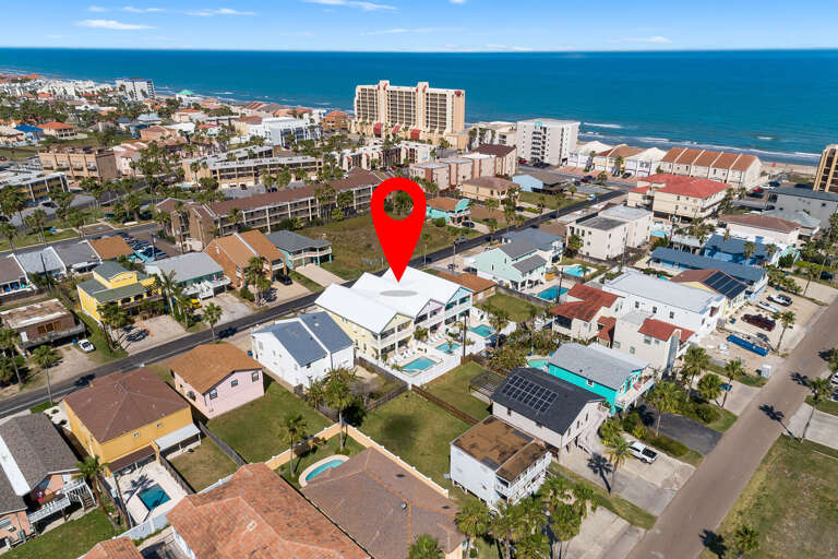 Aerial view of the property with the beach!