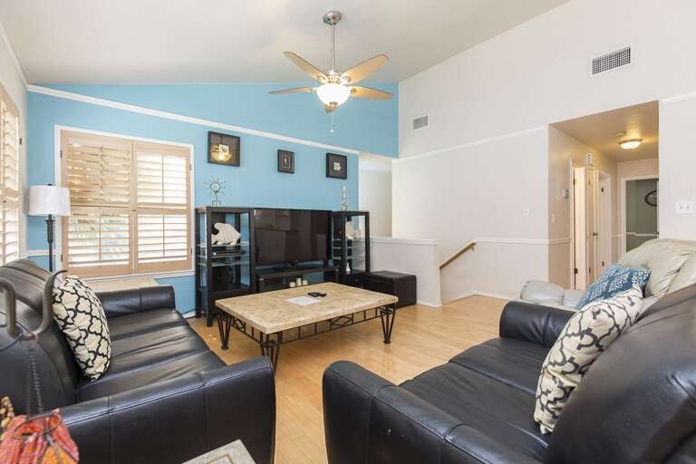 Living Area surrounds a flat screen TV Living Area surrounds a flat screen TV